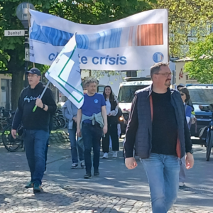 Banner der Scientists for Future mit den Warmingstripes und der Aufschrift climate crisis.